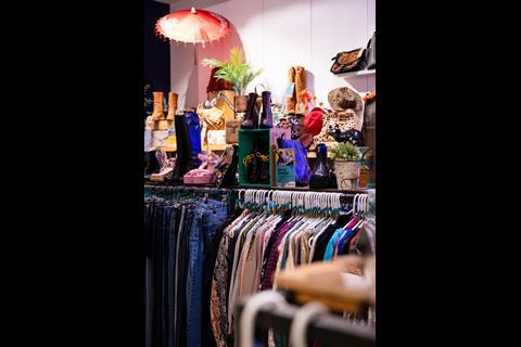 Interior of Charity Super.Mkt store in Bluewater shopping centre, showing fashion  on display